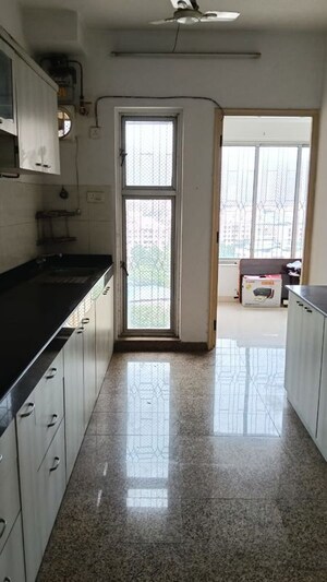 Kitchen in 2.5 BHK Apartment at Tarangan Towers, Samata Nagar – for Rent