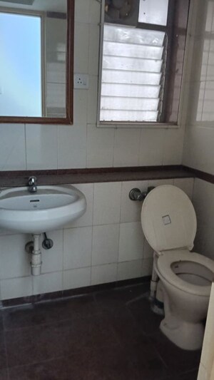 Attached Bathroom in 2.5 BHK Apartment at Tarangan Towers, Samata Nagar – for Rent