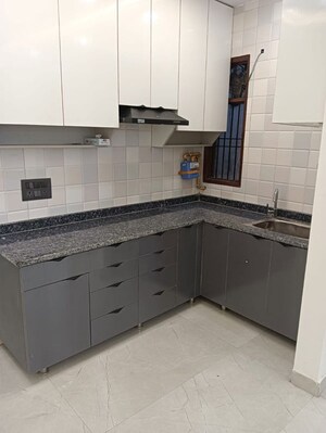 Kitchen in 3 BHK Builder Floor at Freedom Fighters Enclave – for Sale