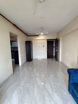 Living Room in 2 BHK Apartment at Platinum Casa Millennia, Andheri West – for Rent