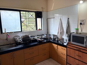 Kitchen in 2 BHK Apartment at Mahesh Paradise, Aundh – for Sale
