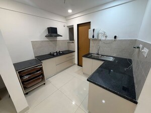 Kitchen in 3 BHK Apartment at Gera World of Joy, Kharadi – for Rent