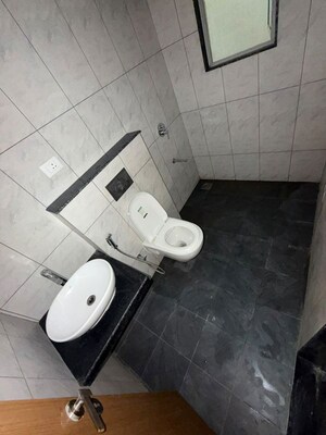 Bathroom in 3 BHK Apartment at Gera World of Joy, Kharadi – for Rent