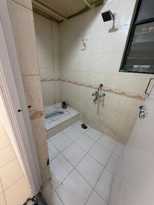 Bathroom in 2 BHK Apartment at Kedarnath Homes, Kothrud – for Rent
