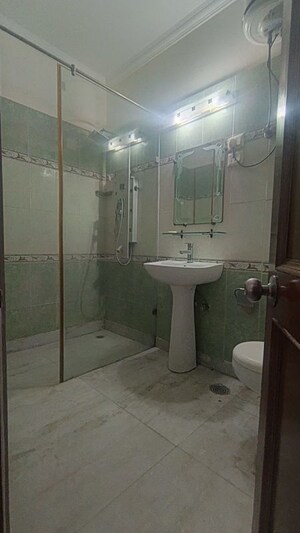 Bathroom in 4 BHK Builder Floor at Greater Kailash I – for Rent
