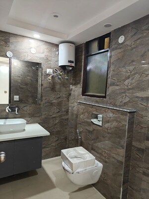 Bathroom in 3.5 BHK Apartment at Ambience Creacions, Sector 22 – for Rent
