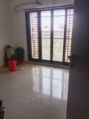 Room in 2.5 BHK Apartment at Relcon Rajat Dhaulagiri, Vile Parle East – for Rent
