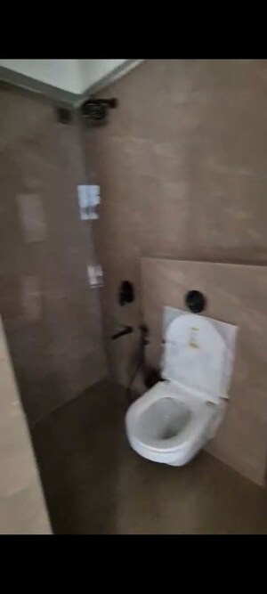 Bathroom in 3 BHK Apartment at Nirmaan Heena, Vile Parle East – for Rent