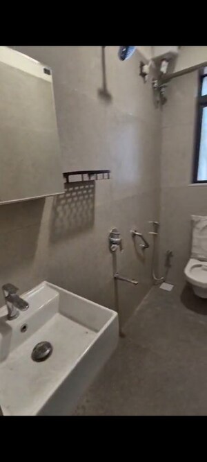 Bathroom in 3 BHK Apartment at Nirmaan Heena, Vile Parle East – for Rent