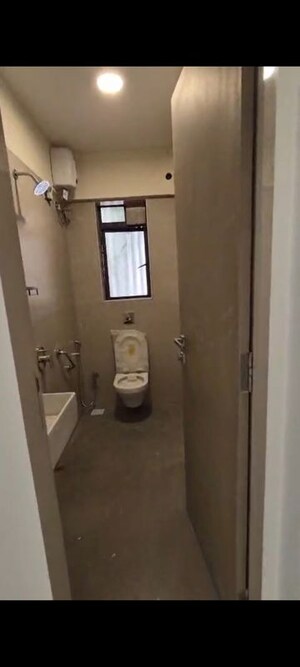 Bathroom in 3 BHK Apartment at Nirmaan Heena, Vile Parle East – for Rent