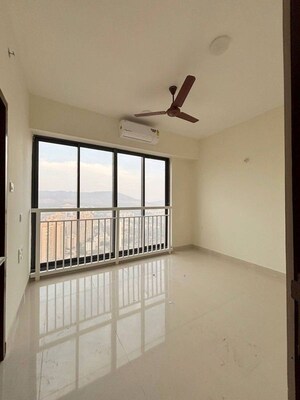 Room in 2 BHK Apartment at Dynamix Divum, Malad East – for Rent