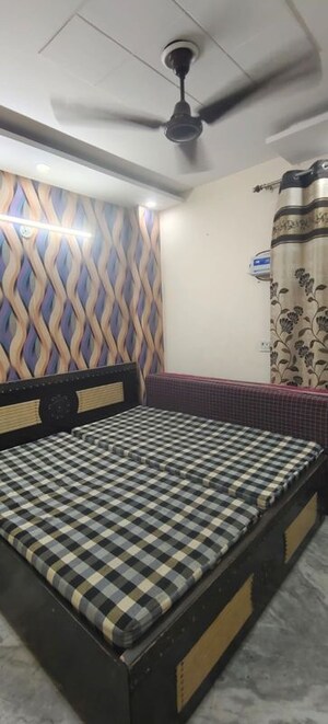 Bedroom in 2 BHK Builder Floor at Dwarka Mor – for Rent
