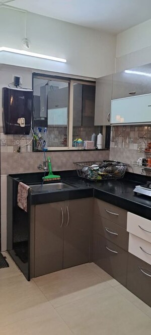 Kitchen in 2 BHK Apartment at Mittal Brothers Whistling Palms, Wakad – for Rent