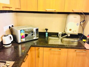 Kitchen in 2.5 BHK Apartment at Central Park Resorts, Sector 48 – for Rent