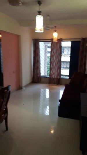 Living Room in 1 BHK Apartment at Abhar CHS, Andheri West – for Rent
