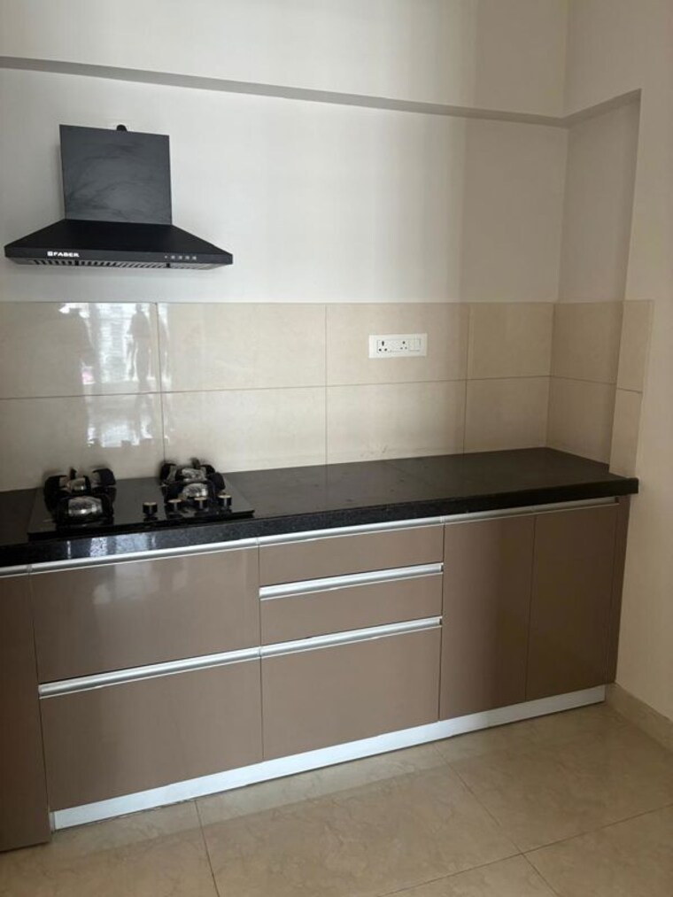 Kitchen, gera-planet-of-joy 2 Bedroom 1000 Sq.Ft. Apartment In Kharadi Pune 10776861