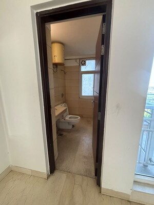 Bathroom in 3 BHK Apartment at Puri Diplomatic Greens Villas, Sector 111 – for Rent