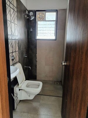Bathroom in 2 BHK Apartment at Vision Starwest Phase 1, Tathawade – for Rent