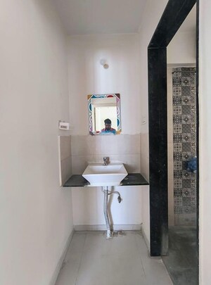Bathroom in 2 BHK Apartment at Mittal High Mont, Hinjewadi – for Rent