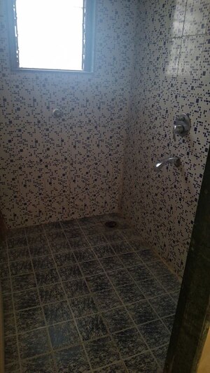 Bathroom in 1 BHK Apartment at Megh Malhar Co-op Housing Society, Ghansoli – for Rent