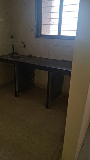 Kitchen in 1 BHK Apartment at Megh Malhar Co-op Housing Society, Ghansoli – for Rent