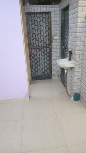 Bathroom in 1 BHK Apartment at Girnar Mahal CHS, Vasai West – for Rent