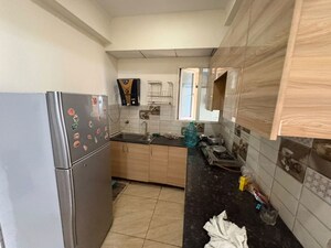 Kitchen in 2 BHK Apartment at Gaur City 7th Avenue, Sector 4 Greater Noida – for Rent
