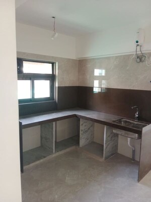 Kitchen in 2 BHK Apartment at Regent Aparna Mahal, Vile Parle East – for Sale
