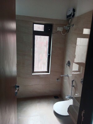 Bathroom in 2 BHK Apartment at Regent Aparna Mahal, Vile Parle East – for Sale
