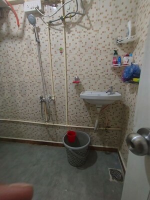 Bathroom in 1 RK Apartment at Royal Palms Piccadilly Condos, Goregaon East – for Rent