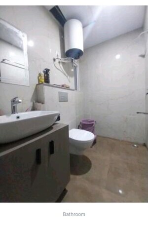Bathroom in 2.5 BHK Builder Floor at Smart World Gems, Sector 89 – for Rent