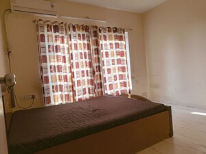 Bedroom in 1 BHK Apartment at Royal Palms Garden View, Goregaon East – for Rent