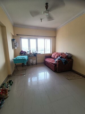 Living Room in 1 BHK Apartment at Crystal Isle Apartment, Goregaon East – for Sale