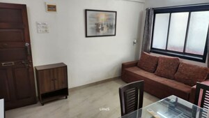 Living Room in 1 BHK Apartment at Windermere CHS Andheri West, Andheri West – for Rent