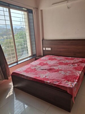Bedroom in 2 BHK Apartment at Mittal Sun Exotica, Yewalewadi – for Rent