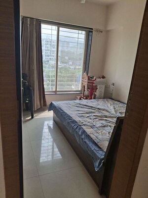 Bedroom in 2 BHK Apartment at Mittal Sun Exotica, Yewalewadi – for Rent