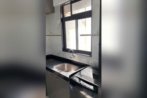 Kitchen in 2 BHK Apartment at Dev Leo Tower, Oshiwara – for Rent