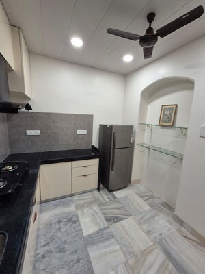 Kitchen in 1 BHK Apartment at Breach Candy – for Rent