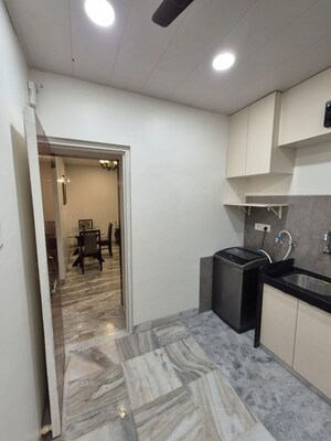 Kitchen in 1 BHK Apartment at Breach Candy – for Rent