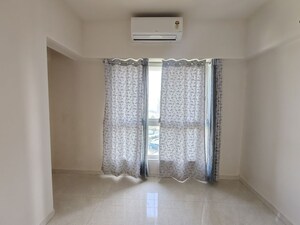 Room in 2 BHK Apartment at Lodha Amara, Kolshet Road – for Sale
