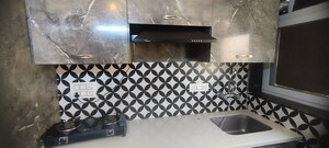 Kitchen in Studio Apartment at DLF Capital Greens Phase I And II, Moti Nagar – for Rent