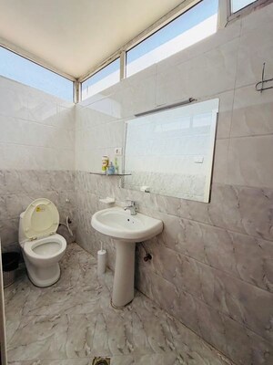 Bathroom in 2 BHK Apartment at Geeta Nagar – for Sale