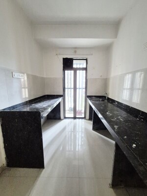 Kitchen in 1 BHK Apartment at Runwal My City Phase II Cluster 05, Dombivli East – for Rent