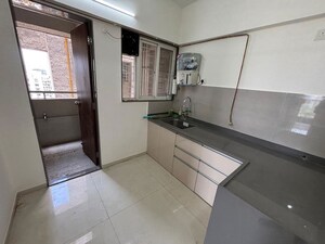 Kitchen in 2 BHK Apartment at Divine Palm Springs, Wakad – for Rent