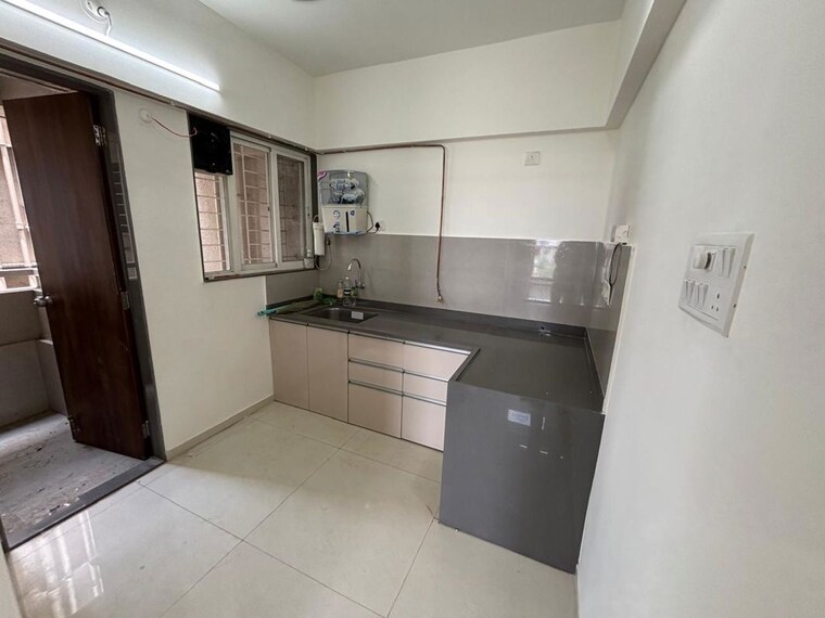 Kitchen, divine-palm-springs 2 Bedroom 825 Sq.Ft. Apartment In Wakad Pune 10777998