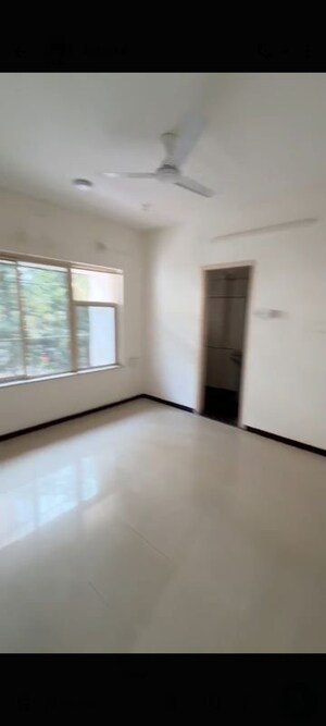 Room in 2 BHK Apartment at Grenville CHS, Andheri West – for Rent