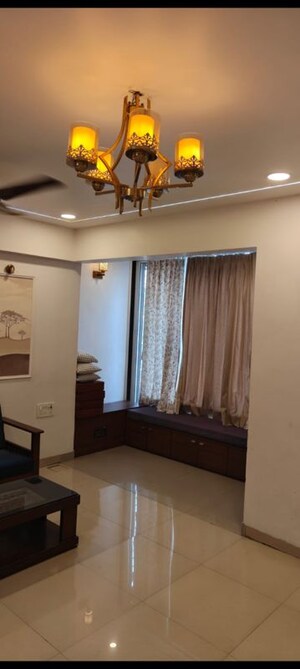 Living Room in 1 BHK Apartment at Godrej Emerald, Ghodbunder Road – for Rent