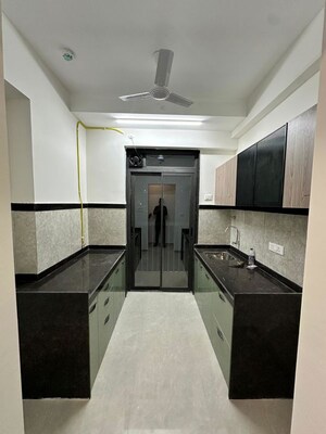 Kitchen in 2 BHK Apartment at Cosmos Enclave, Kasarvadavali – for Rent