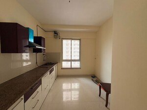 Kitchen in 1 BHK Apartment at Puranik Rumah Bali, Ghodbunder Road – for Sale