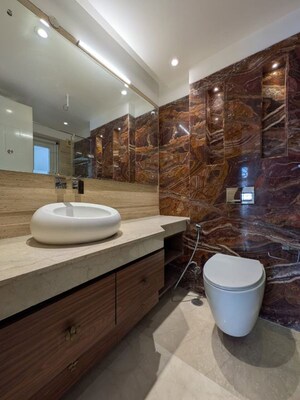 Bathroom in 4 BHK Builder Floor at Green Park Extension – for Rent